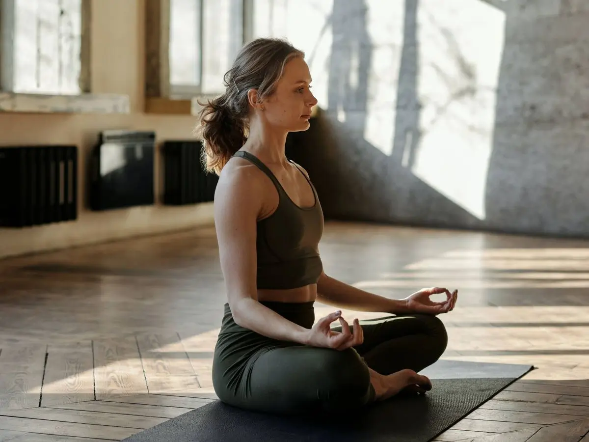 Women practing yoga on Fitsse app
